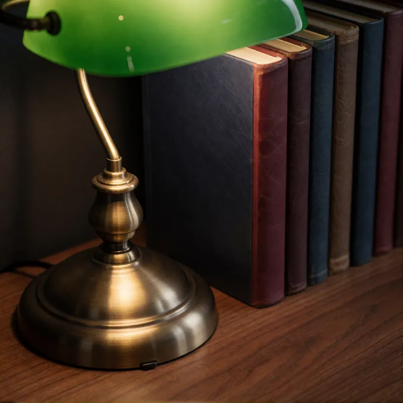 A brass banker's lamp on the partner's desk — Woodside CPA Services